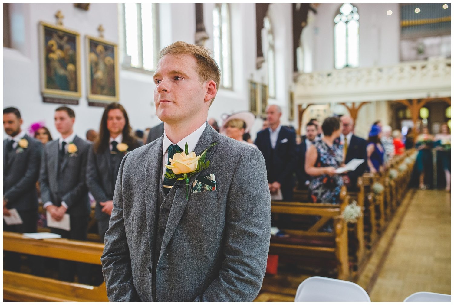 groom looking nervous in church